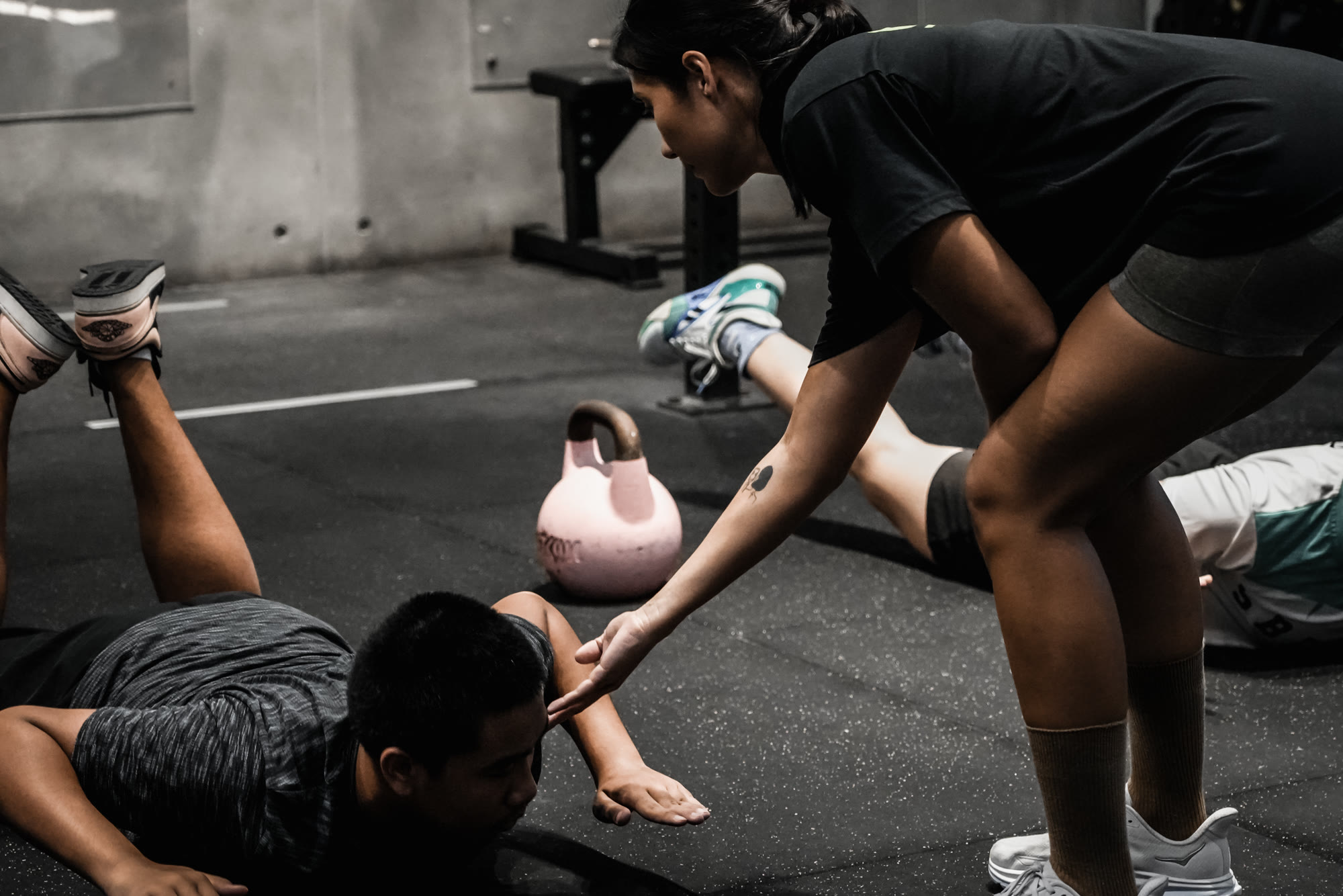 A Subtero coach leading training on the gym floor.